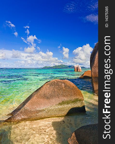 Stones on tropical beach at Seychelles - nature background