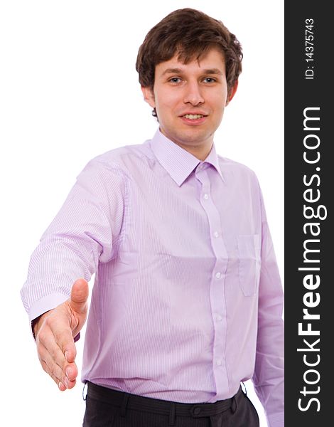 Young adult male isolated on white background presenting welcome gesture with his right hand moved forward. Young adult male isolated on white background presenting welcome gesture with his right hand moved forward