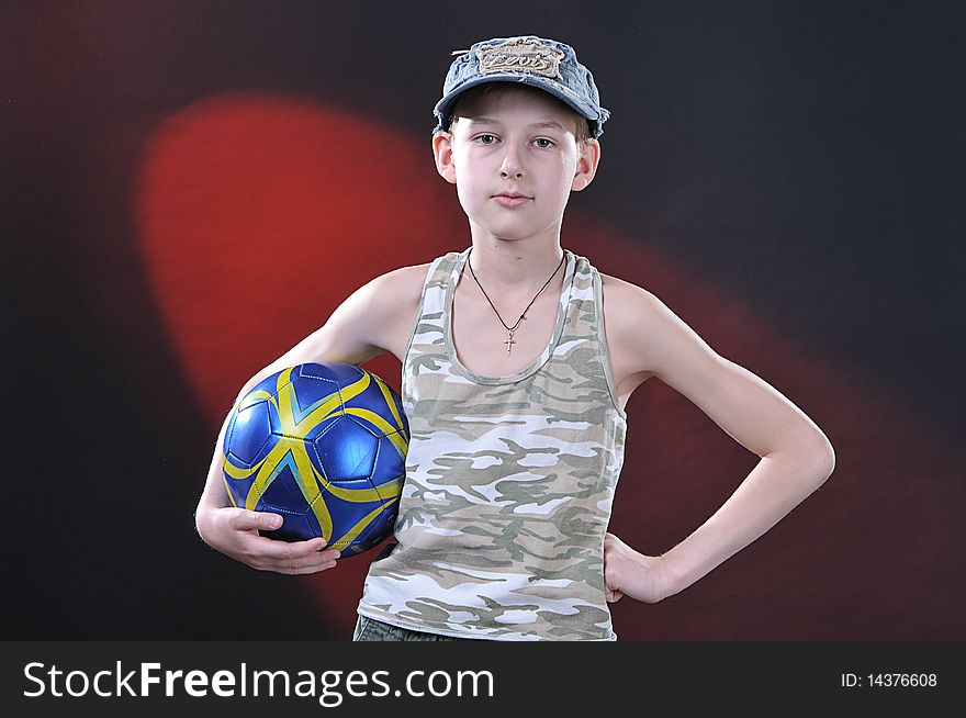 Boy Of Ten Years With A Ball
