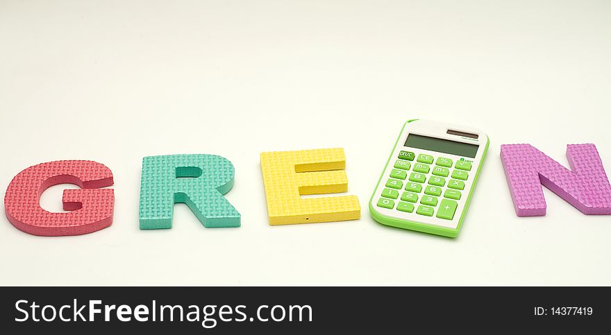 A green calculator in green alphabet with white background