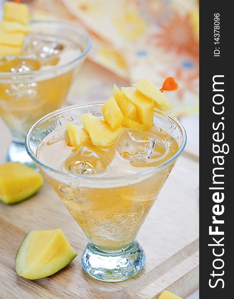 Cocktail of mango with pieces of the fruit. Cocktail of mango with pieces of the fruit