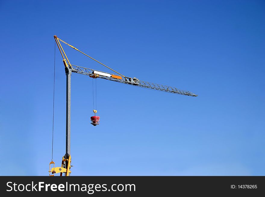 Construction crane on havy blue sky. Construction crane on havy blue sky.