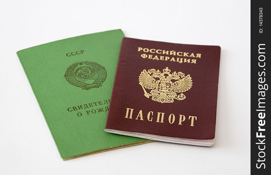 The Russian passport lies on the Soviet document on a birth. The Russian passport lies on the Soviet document on a birth