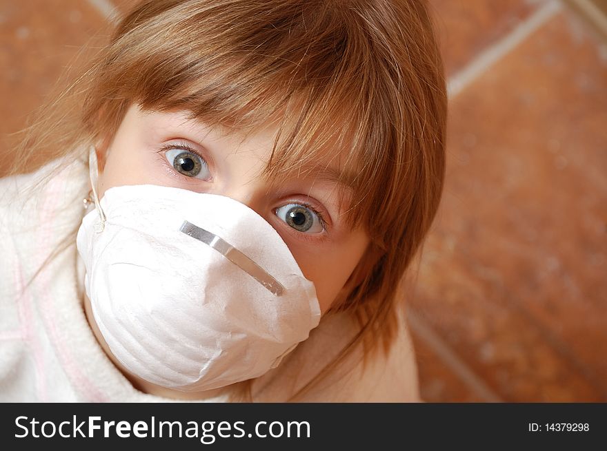 Child with medical mask