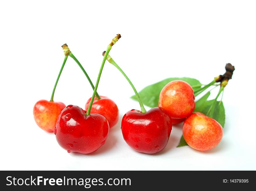 Fresh cherry fruits isolated on a white background
