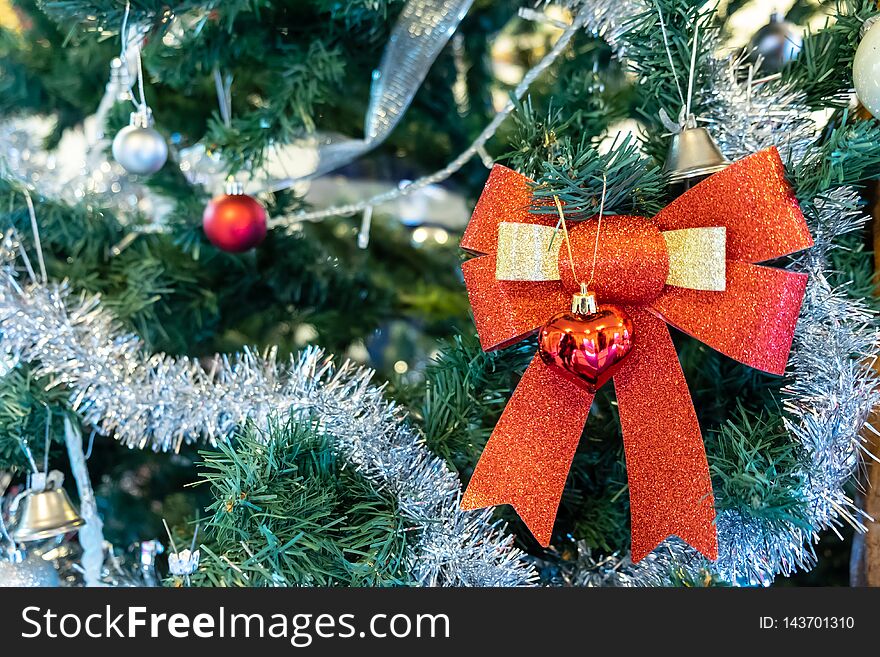 Various accessories such as bow bells, balls on the Christmas tree