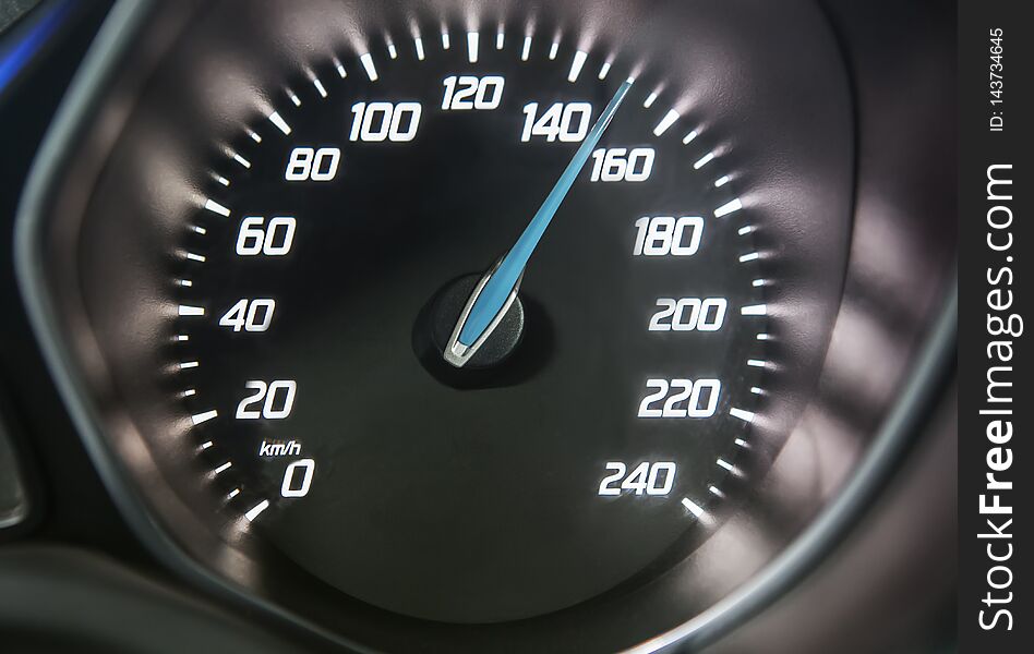 Close up of car speedometer with speed indicating 150 km