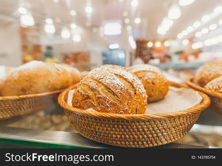 Closeup of bread in the bakery shop. Fresh bread. Organic bread background. Bali island.