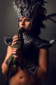 Pagan Priest In Ritual Suit With Green Iguana Stock Photos Pagan Priest In Ritual Suit With Green Iguana Stock Photos