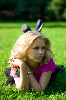 Beautyful Girl On Grass Royalty Free Stock Images