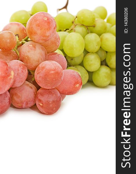 Red and green fresh grapes isolated