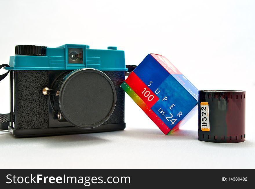 A picture of a toy camera, bringing us back to the days of analog photography.
