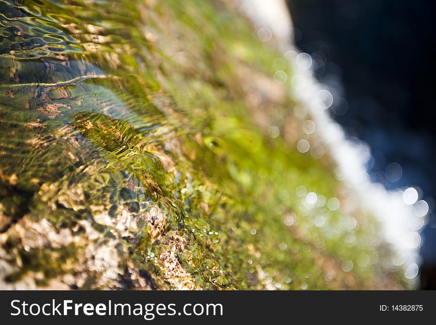 Water flowing on a rocky mountain. Water flowing on a rocky mountain