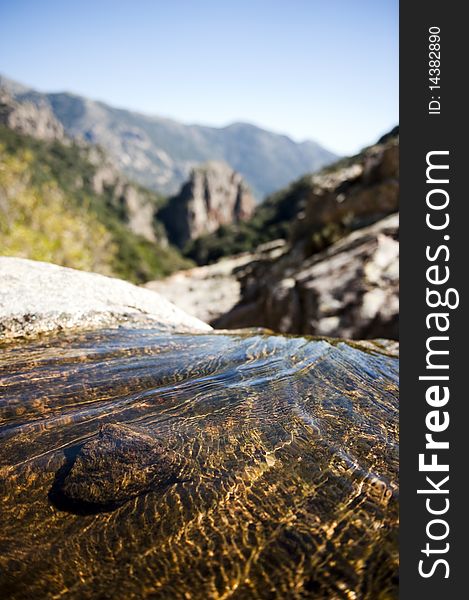 Water flowing on a rocky mountain. Water flowing on a rocky mountain