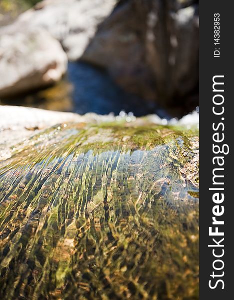 Water flowing on a rocky mountain. Water flowing on a rocky mountain