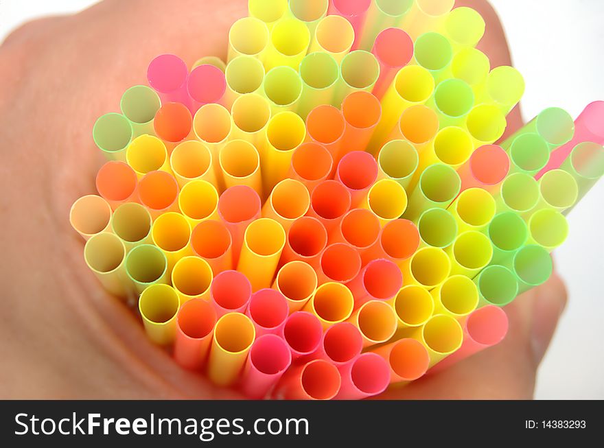 Bunch of colorful drinking straw held in hand!. Bunch of colorful drinking straw held in hand!