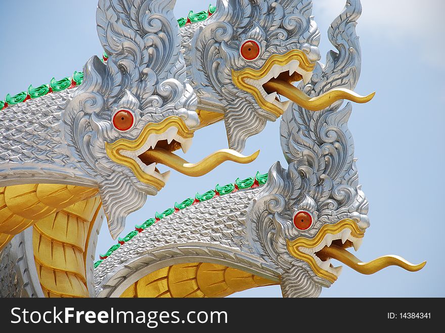 Three white  Nagas  at  temple in Thailand.