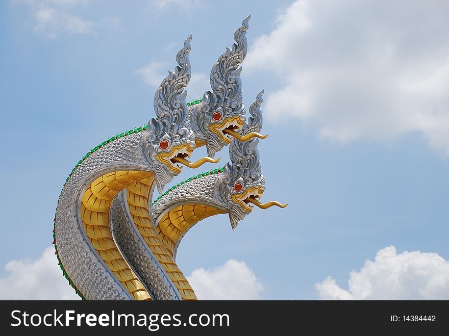 Three white Nagas at temple in Thailand.