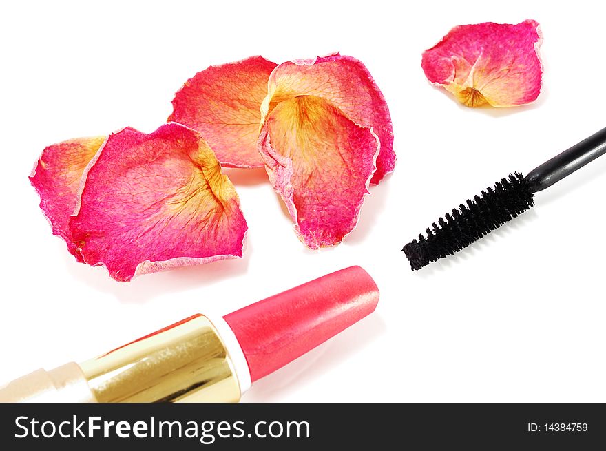 Lipstick with a brush for eyelashes isolated on a white background. Lipstick with a brush for eyelashes isolated on a white background