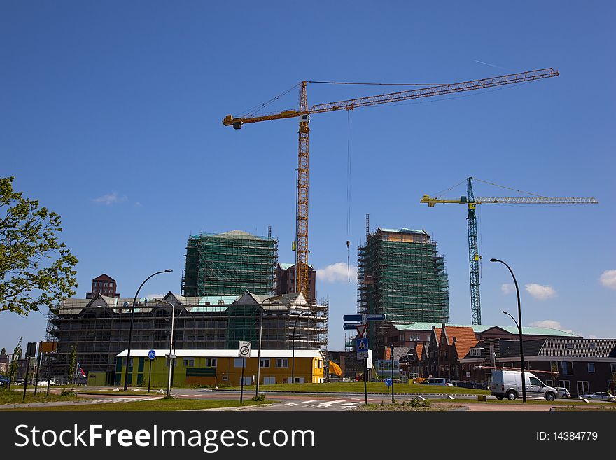 A construction site with bulding cranes