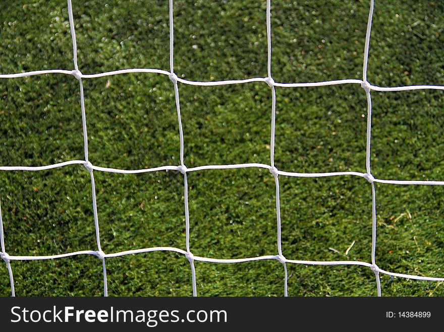 Closeup on the white soccer goal net