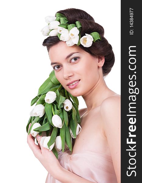 Pretty young woman with spring tulips. Pretty young woman with spring tulips