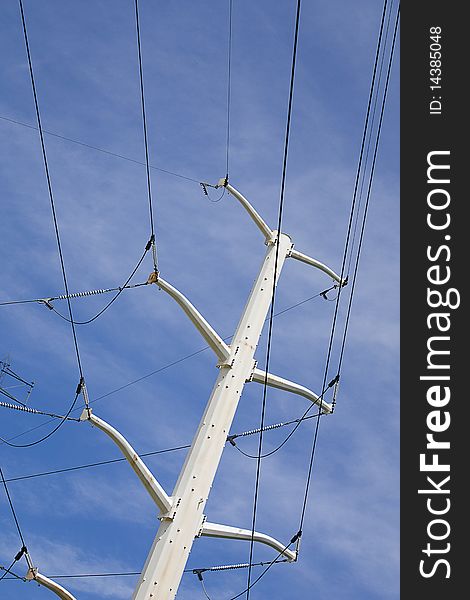 Power lines against a blue sky. Power lines against a blue sky