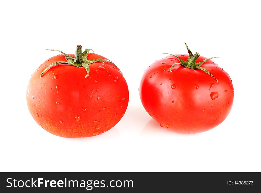 Two fresh tomatoes isolated on white