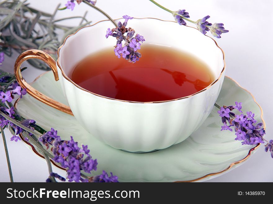 A Cup of tea and flowers of the lavender