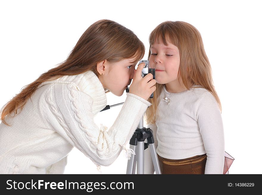 Girls with the camera on a white background