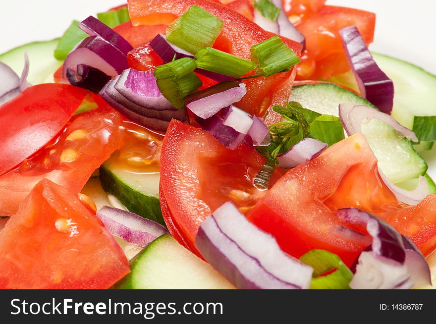 Salad from fresh a tomato of cucumbers and onions. Salad from fresh a tomato of cucumbers and onions