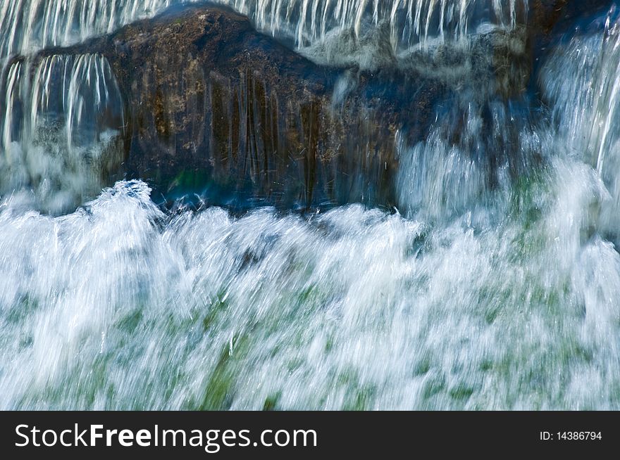 Fast rough falls of the river in the spring