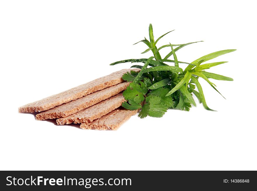 Crispbread with estragon isolated on a white background