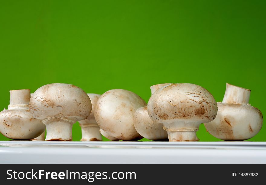 Fresh Mushrooms On A White Table