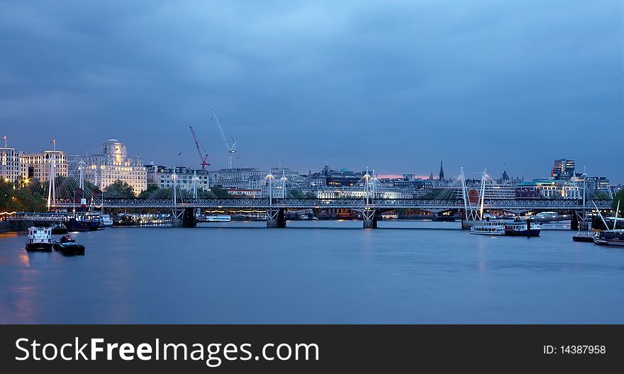 View of the Themes  and a bridge in London at the evening. View of the Themes  and a bridge in London at the evening