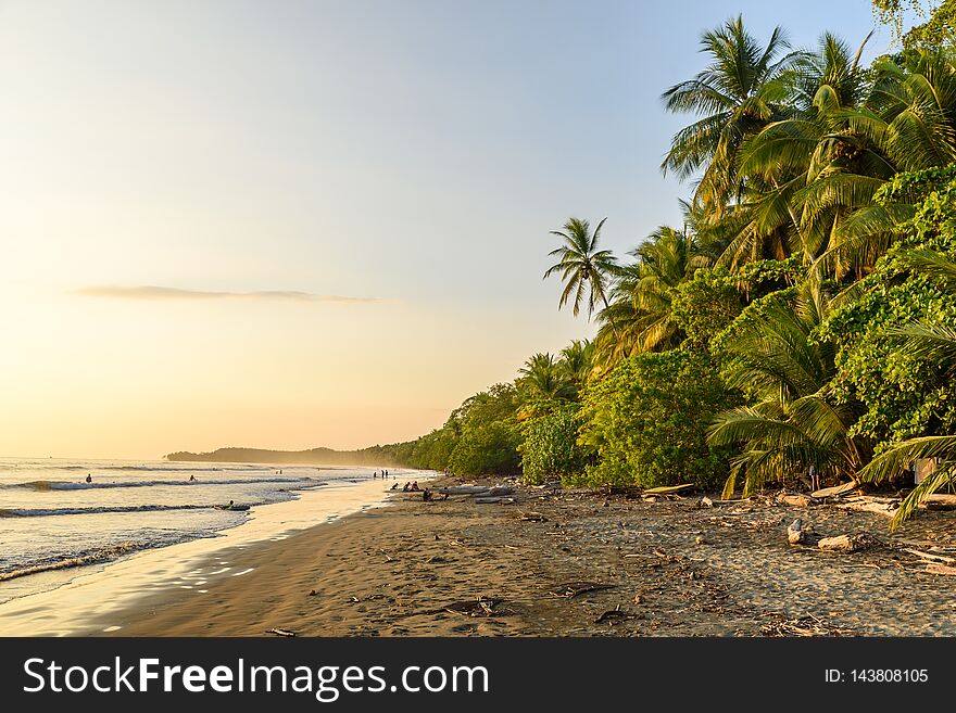 Sunset at paradise beach in Uvita, Costa Rica - beautiful beaches and tropical forest at pacific coast of Costa Rica - travel