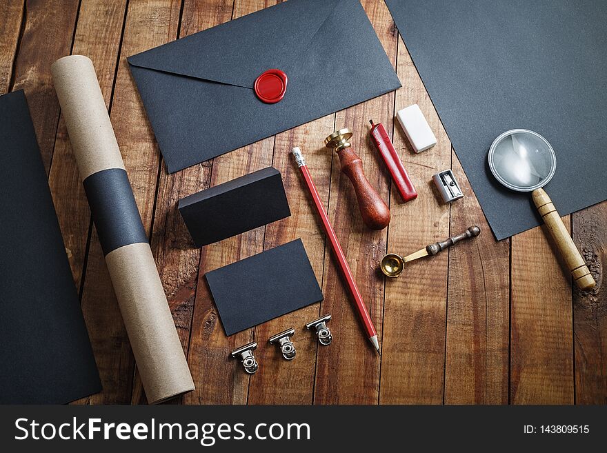 Blank vintage stationery on wood table background. Responsive design template. Mockup for branding identity