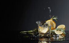 Cocktail Gin-tonic With Lemon Slices And Twigs Of Rosemary Stock Images