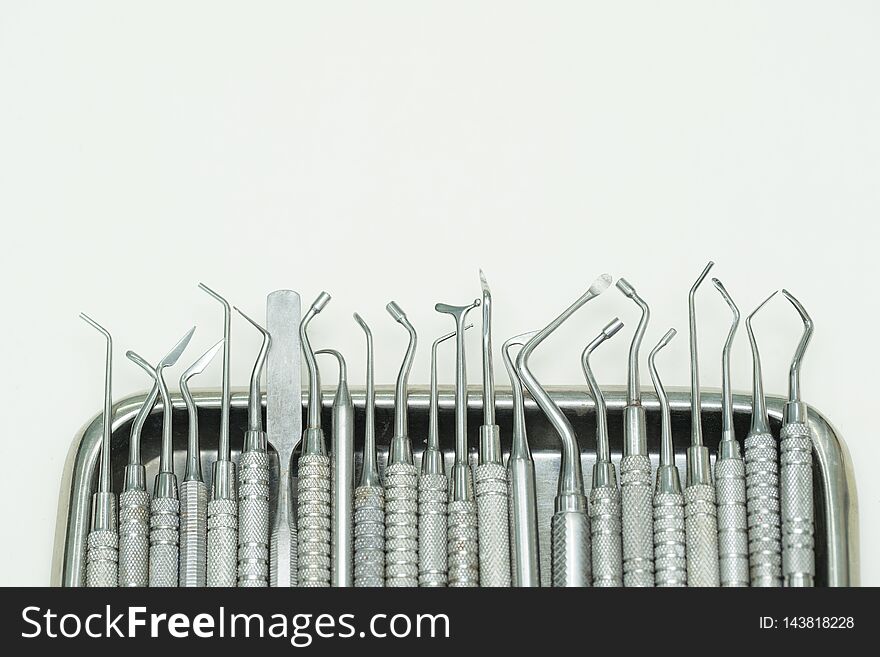 Group of dentist tools  on white background