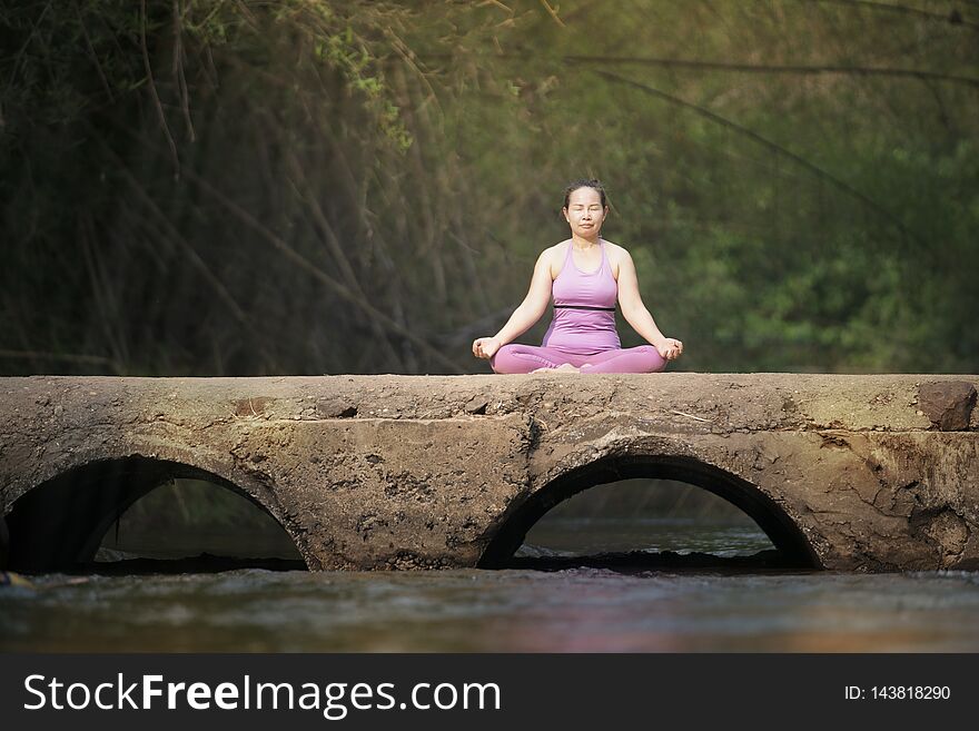 Woman practice yoga with nature