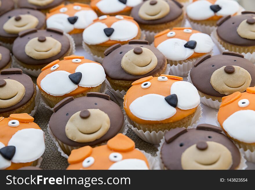 small cake with coated face of pastry paste