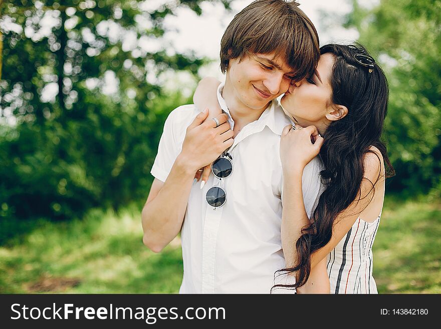 Cute couple in a summer park