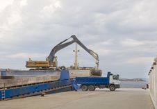 Crane Unloads A Ship In A Truck In The Port Stock Photography Crane Unloads A Ship In A Truck In The Port Stock Photography