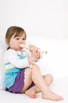 Little Girl With Instrument Royalty Free Stock Photography Little Girl With Instrument Royalty Free Stock Photography
