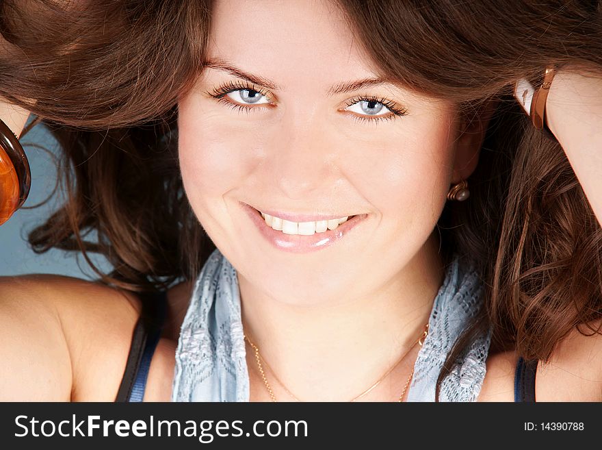 Portrait of beautiful happy smiling young woman, studio shot. Portrait of beautiful happy smiling young woman, studio shot