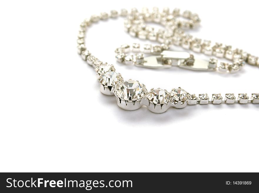 Necklace with  white gemstones isolated on white background.