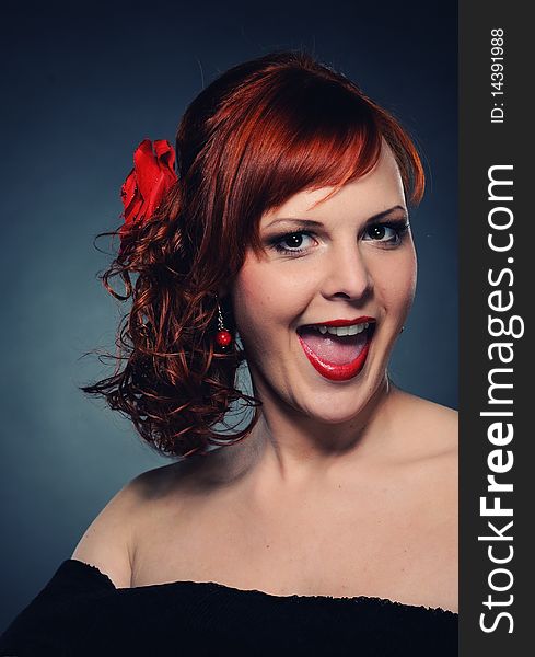 Portrait of an attractive redhead woman