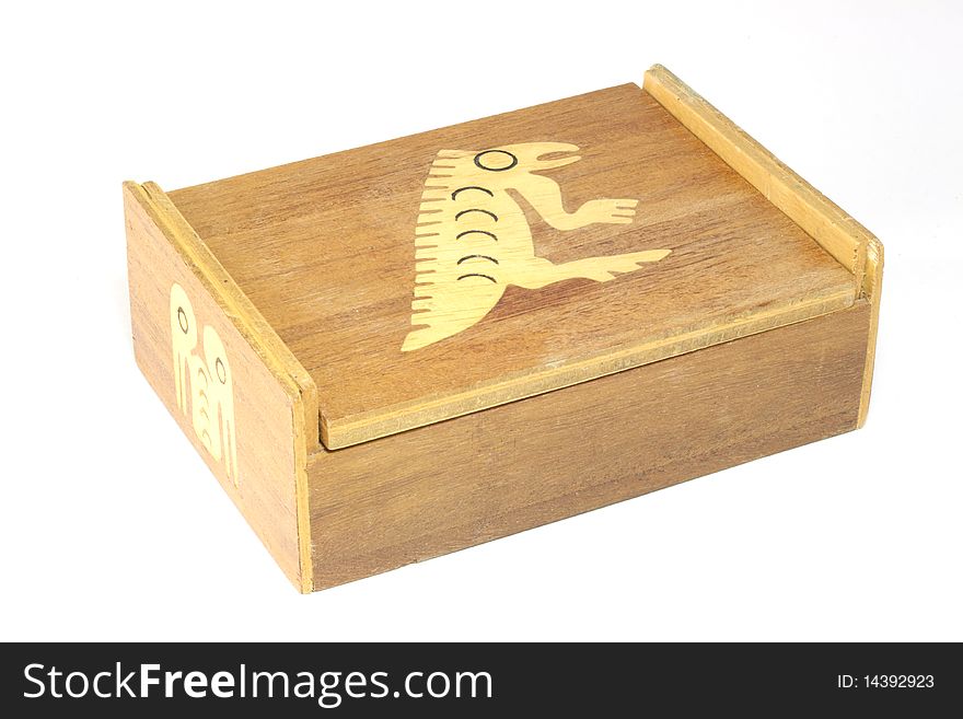 A handmade Ecuadorean box, inlaid with an stylized iguana