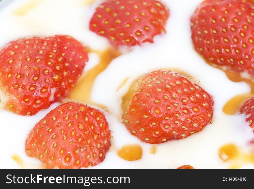 Yoghurt with strawberries and sweet sauce. Yoghurt with strawberries and sweet sauce