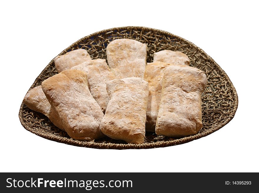 A Wicker Basket Containing a Display of Floured Bread. A Wicker Basket Containing a Display of Floured Bread.